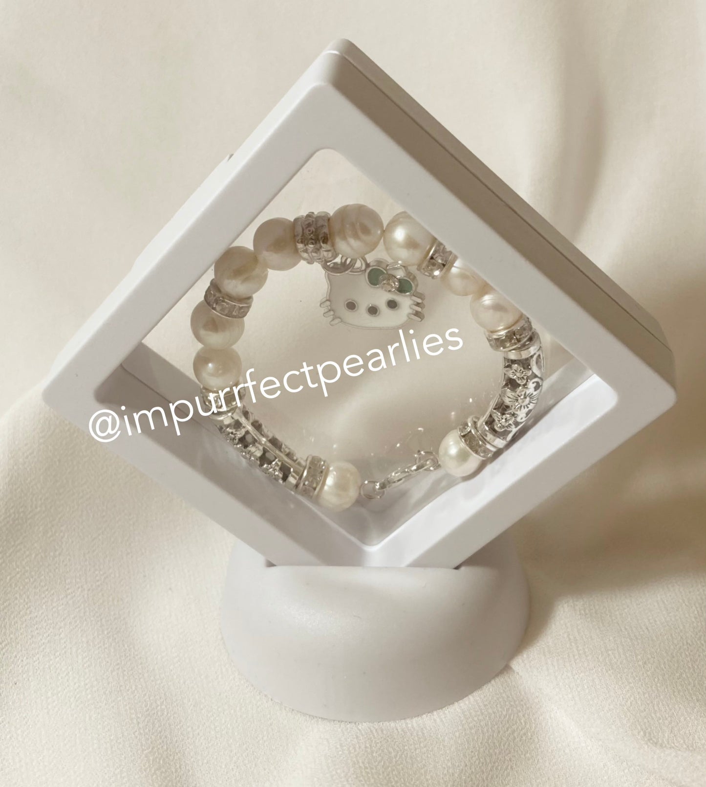 Fresh water white pearls with hello kitty stainless steel pendant